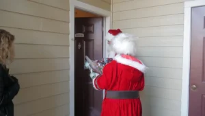 The Clauses knocking on the door.